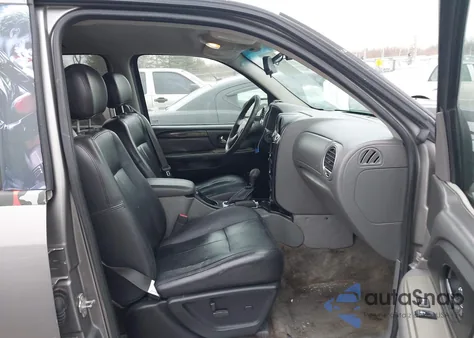 2005 GMC Envoy Sle z USA, uszkodzony, nr VIN 1GKDS13S852358610